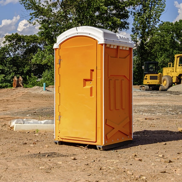 how often are the porta potties cleaned and serviced during a rental period in Holly